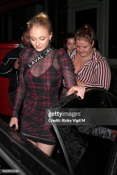 Sophie Turner leaves Sexy Fish after dining with friends at Sexy Fish on May 26, 2018 in London, England.