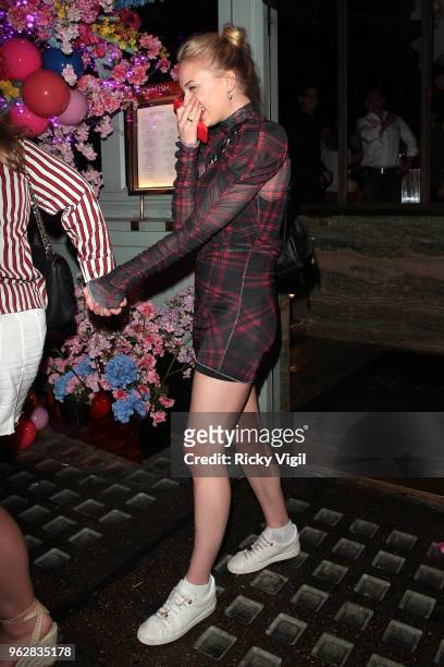 Sophie Turner leaves Sexy Fish after dining with friends at Sexy Fish on May 26, 2018 in London, England.