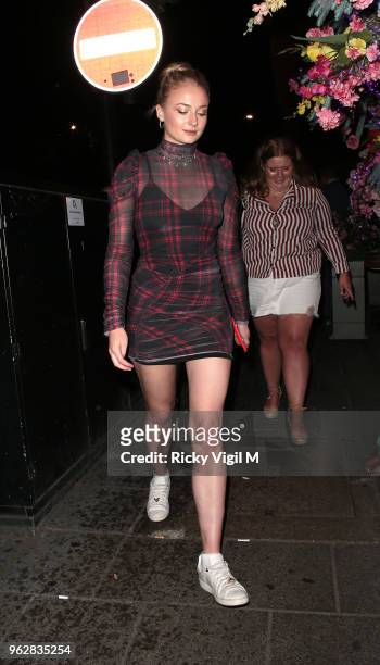 Sophie Turner leaves Sexy Fish after dining with friends at Sexy Fish on May 26, 2018 in London, England.