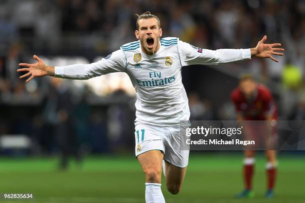 Gareth Bale of Real Madrid celebrates scoring his side's second goal during the UEFA Champions League Final between Real Madrid and Liverpool at NSC...