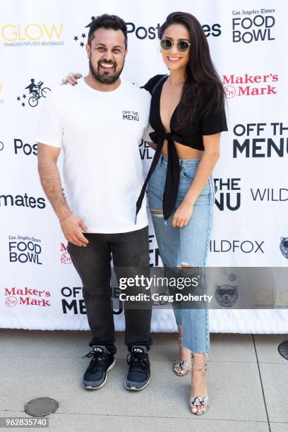 Off the Menu Founder & CEO Lawrence Longo and Actress Shay Mitchell attend the Los Angeles Times Food Bowl Secret Burger Showdown at Wallis Annenberg...