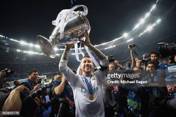 Sergio Ramos of Real Madrid celebrates with the UEFA Champions League Trophy following his sides victory in the UEFA Champions League Final between...