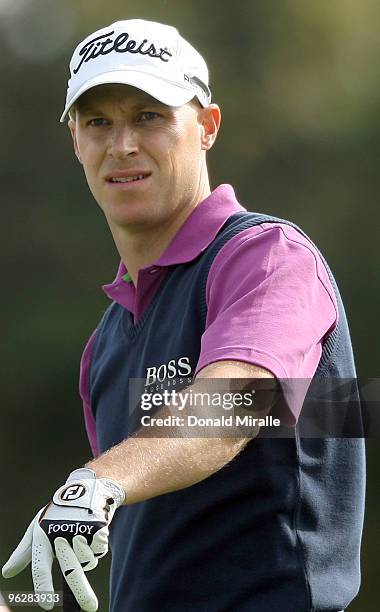 Ben Crane prepares to tee off the 18th hole during the third round of the 2010 Farmers Insurance Open on January 30, 2010 at Torrey Pines Golf Course...