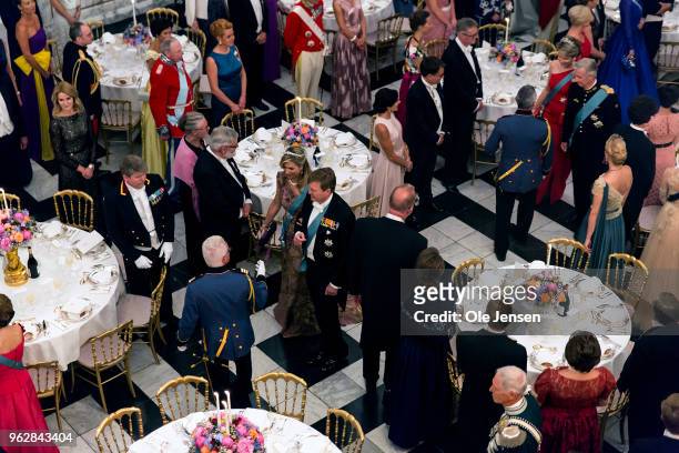 King Willem Alexander of the Nederlands and his wife Queen Maxima are lead to their table at The Knights hall where Queen Margrethe of Denmark host...