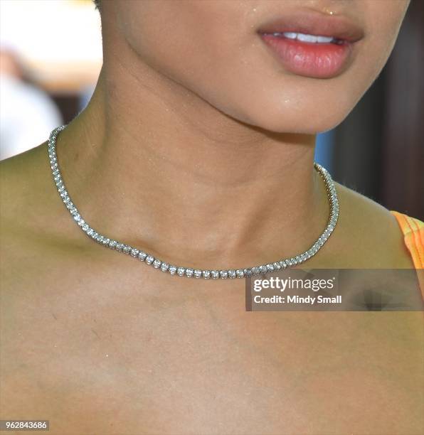 Tori Brixx necklace detail, performs at the pool at The Linq Hotel & Casino on May 26, 2018 in Las Vegas, Nevada.