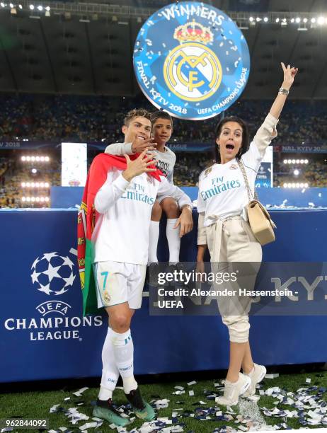 Cristiano Ronaldo of Real Madrid celebrates with Georgina Rodriguez and his son Cristiano Ronaldo jr. Following his sides victory in the UEFA...