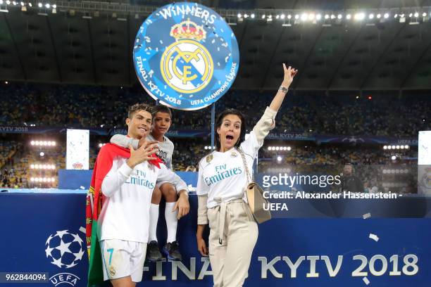 Cristiano Ronaldo of Real Madrid celebrates with Georgina Rodriguez and his son Cristiano Ronaldo jr. Following his sides victory in the UEFA...