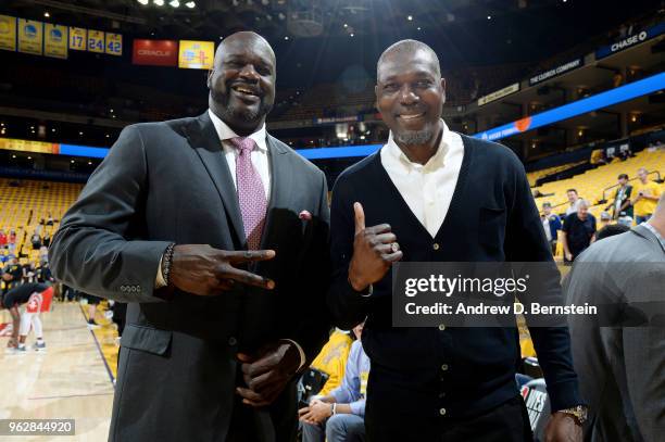 Shaquille O'Neal and Hakeem Olajuwon before the game between the Houston Rockets and the Golden State Warriors during Game Six of the Western...