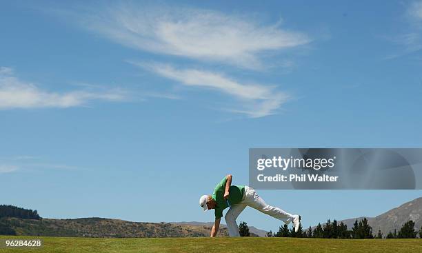 Andrew Dodt of Australia retrieves his ball on the 1st green during day four of the New Zealand Open at The Hills Golf Club on January 31, 2010 in...