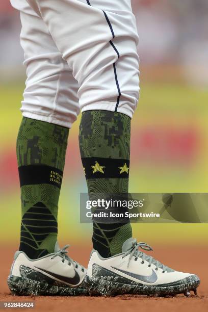 Cleveland Indians third baseman Jose Ramirez wears camouflage socks and cleats for Memorial Day Weekend during the first inning of the Major League...