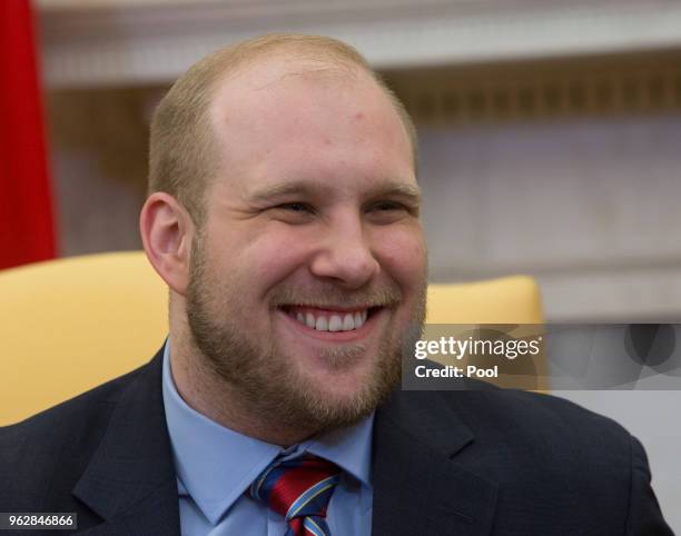 Joshua Holt smiles in a meeting with U.S. President Donald Trump, members of his family and the congressional delegation of Utah at The White House...