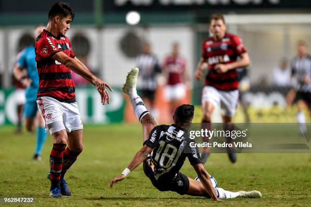 Erik of Atletico MG and Duarte of Flamengo battle for the ball during a match between Atletico MG and Flamengo as part of Brasileirao Series A 2018...