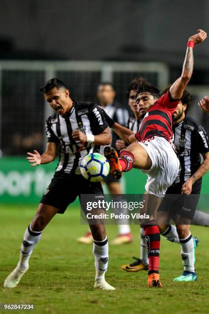 Erik of Atletico MG and Duarte of Flamengo battle for the ball during a match between Atletico MG and Flamengo as part of Brasileirao Series A 2018...