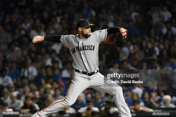 Hunter Strickland of the San Francisco Giants pitches against the Chicago Cubs during the ninth inning on May 26, 2018 at Wrigley Field in Chicago,...