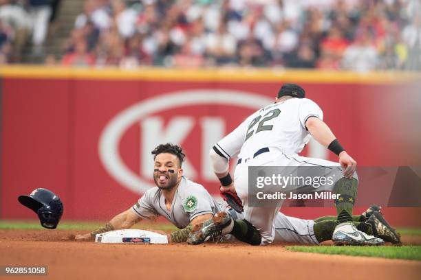 Jose Altuve of the Houston Astros is safe last second on a stolen base as second baseman Jason Kipnis of the Cleveland Indians tries to make the tag...