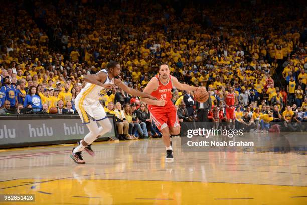 Ryan Anderson of the Houston Rockets handles the ball during game against the Golden State Warriors during Game Six of the Western Conference Finals...