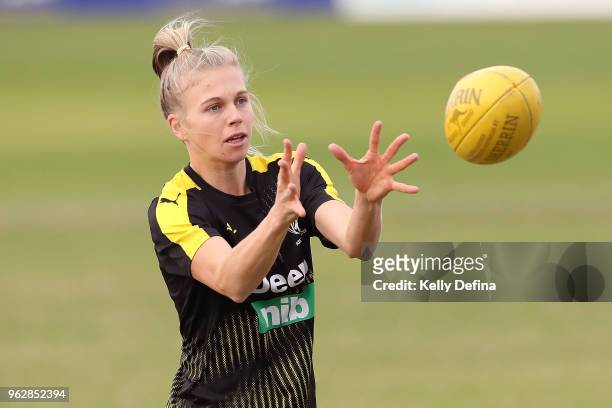 Jacqueline Graham of the Tigers marks the ball while warming up prior to the round four VFLW match between Williamstown and Richmond at Williamstown...