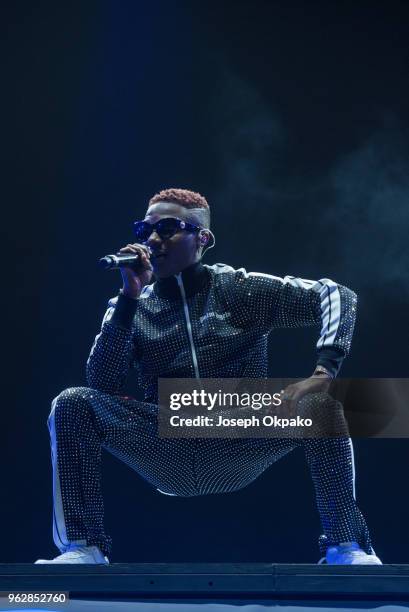 Wizkid performs on stage during AFROREPUBLIK festival at The O2 Arena on May 26, 2018 in London, England.