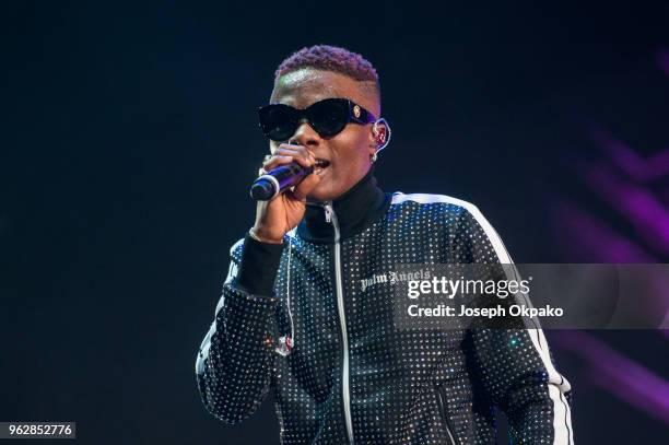 Wizkid performs on stage during AFROREPUBLIK festival at The O2 Arena on May 26, 2018 in London, England.