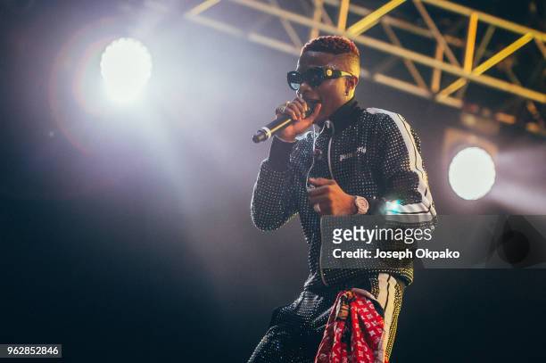 Wizkid performs on stage during AFROREPUBLIK festival at The O2 Arena on May 26, 2018 in London, England.