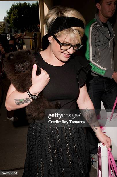 Television personality Kelly Osbourne shops in InterMix on January 30, 2010 in Los Angeles, California.