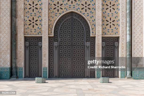hassan ii mosque doors - casablanca, morocco - moroccan culture stock pictures, royalty-free photos & images