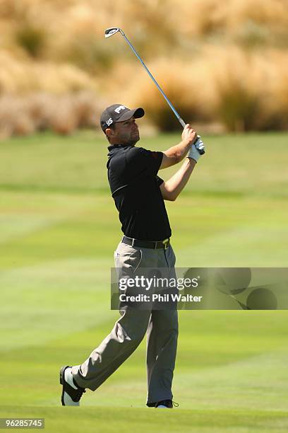 Rob Oppenholm of the USA plays an approach shot on the 14th hole during day four of the New Zealand Open at The Hills Golf Club on January 31, 2010...