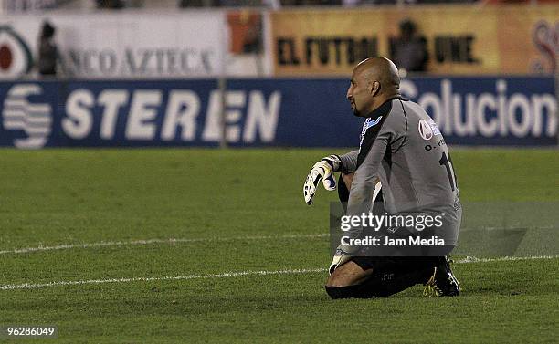 Oscar Perez of Jaguares reacts after failing to defend a kick by Tigres UANL in a 2010 Bicentenario Mexican championship match between Jaguares and...