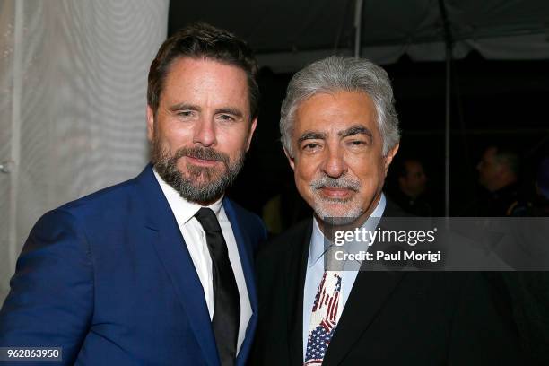 Actor Charles Esten and host Joe Mantegna pose for a photo during the 2018 National Memorial Day Concert - Rehearsals at U.S. Capitol, West Lawn on...