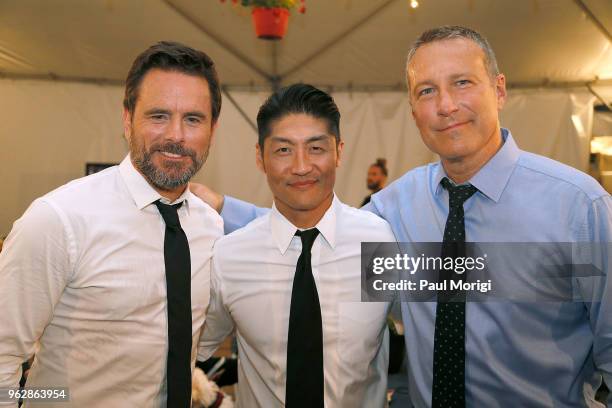 Actors Charles Esten, Brian Tee and John Corbett attend the 2018 National Memorial Day Concert - Rehearsals at U.S. Capitol, West Lawn on May 26,...