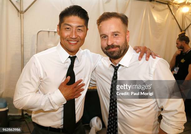 Actor Brian Tee and Tenor Alfie Boe attend the 2018 National Memorial Day Concert - Rehearsals at U.S. Capitol, West Lawn on May 26, 2018 in...