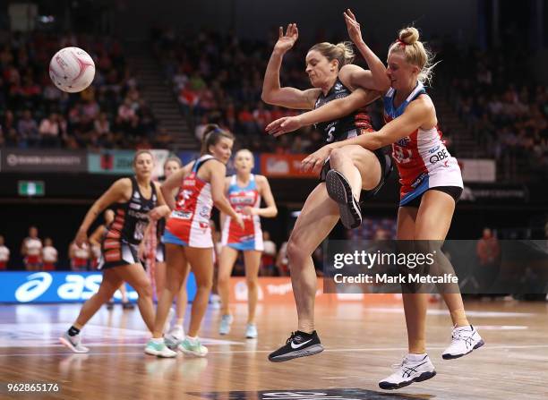 Shae Brown of the Magpies and Maddy Turner of the Swifts compete for the ball during the round five Super Netball match between the Swifts and the...