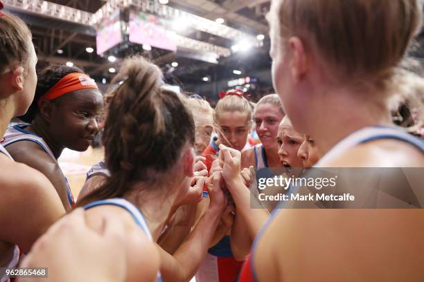 Swifts players talk in a huddle during the round five Super Netball match between the Swifts and the Magpies at Quay Centre on May 27, 2018 in...