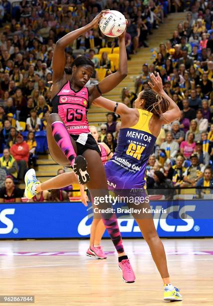 Shimona Nelson of the Thunderbirds and Geva Mentor of the Lightning challenge for the ball during the round five Super Netball match between the...