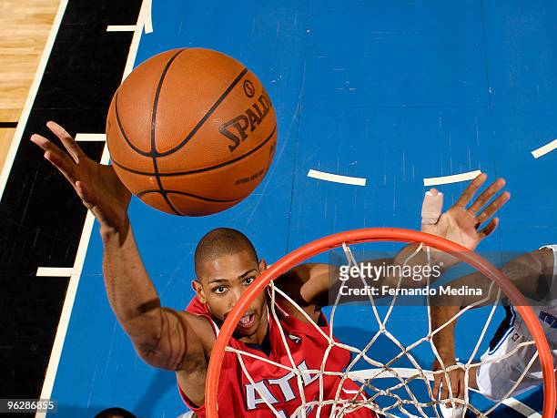 Al Horford of the Atlanta Hawks shoots against the Orlando Magic during the game on January 30, 2010 at Amway Arena in Orlando, Florida. NOTE TO...
