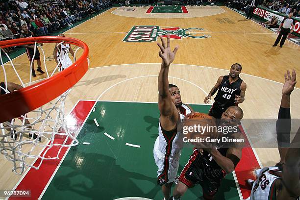 Rafer Alston of the Miami Heat shoots a layup against Kurt Thomas of the Milwaukee Bucks on January 30, 2010 at the Bradley Center in Milwaukee,...