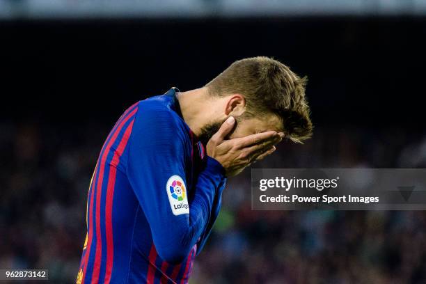 Gerard Pique Bernabeu of FC Barcelona reacts during the La Liga match between Barcelona and Real Sociedad at Camp Nou on May 20, 2018 in Barcelona, .