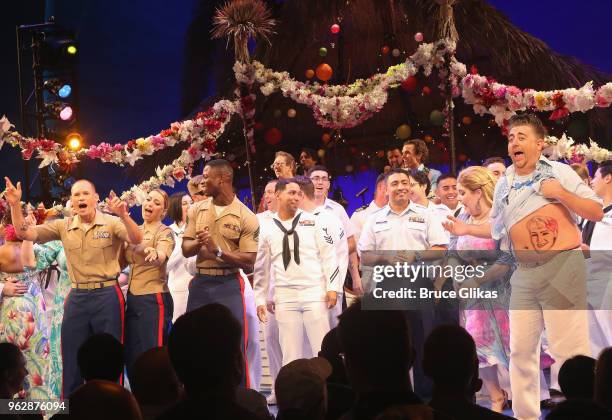 Members of the United States Military join the cast of the Jimmy Buffett Broadway Musical "Escape to Margaritaville" onstage to celebrate Memorial...