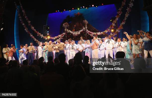 Members of the United States Military join the cast of the Jimmy Buffett Broadway Musical "Escape to Margaritaville" onstage to celebrate Memorial...