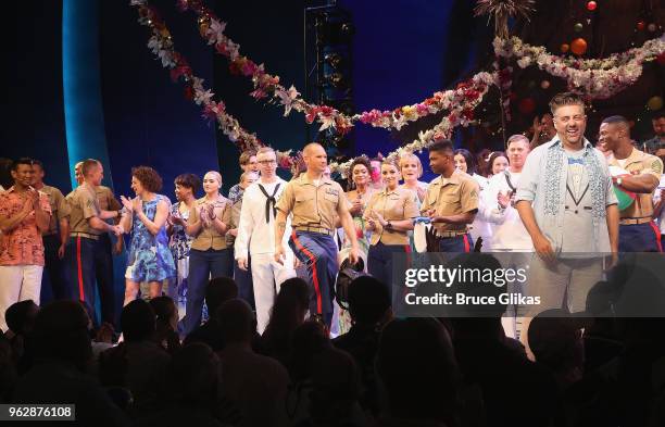 Members of the United States Military join the cast of the Jimmy Buffett Broadway Musical "Escape to Margaritaville" onstage to celebrate Memorial...