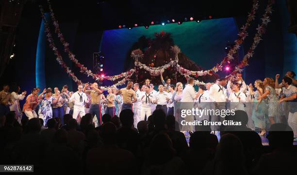 Members of the United States Military join the cast of the Jimmy Buffett Broadway Musical "Escape to Margaritaville" onstage to celebrate Memorial...