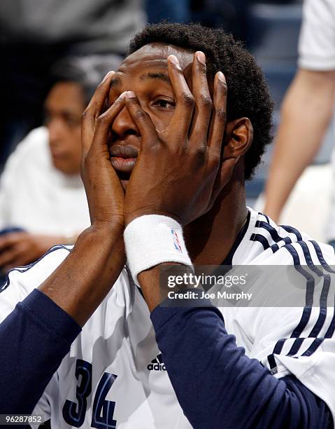 Hasheem Thabeet of the Memphis Grizzlies looks on from the bench with concern during a game against the New Orleans Hornets on January 30, 2010 at...