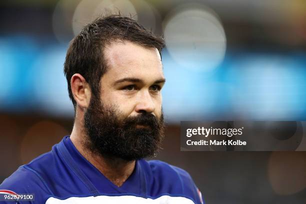 Aaron Woods of the Bulldogs watches on during the round 12 NRL match between the Wests Tigers and the Canterbury Bulldogs at ANZ Stadium on May 27,...