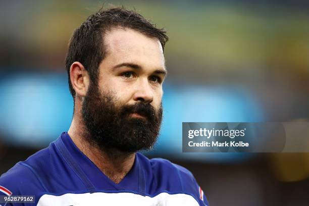 Aaron Woods of the Bulldogs watches on during the round 12 NRL match between the Wests Tigers and the Canterbury Bulldogs at ANZ Stadium on May 27,...