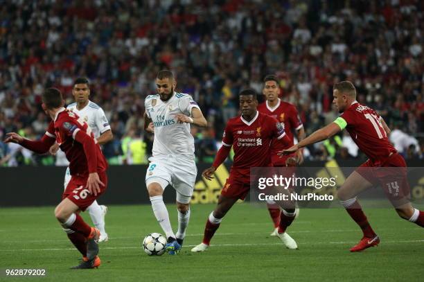 Real Madrid's Karim Benzema, in the center, controls the ball during the final match of the Champions League between Real Madrid and Liverpool at the...