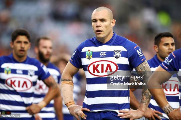 David Klemmer of the Bulldogs watches on during the round 12 NRL match between the Wests Tigers and the Canterbury Bulldogs at ANZ Stadium on May 27,...