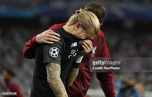 Liverpool's goalkeeper Loris Karius reacts after the final match of the Champions League between Real Madrid and Liverpool at the Olympic Stadium in...