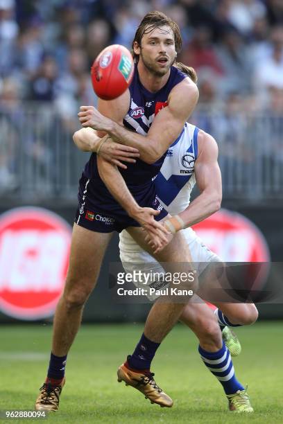 Joel Hamling of the Dockers handballs during the round 10 AFL match between the Fremantle Dockers and the North Melbourne Kangaroos at Optus Stadium...