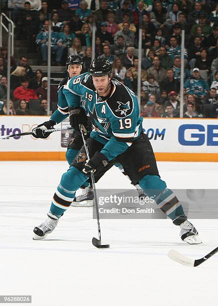 Joe Thornton of the San Jose Sharks maneuvers the puck down the ice during an NHL game against the Minnesota Wild on January 30, 2010 at HP Pavilion...