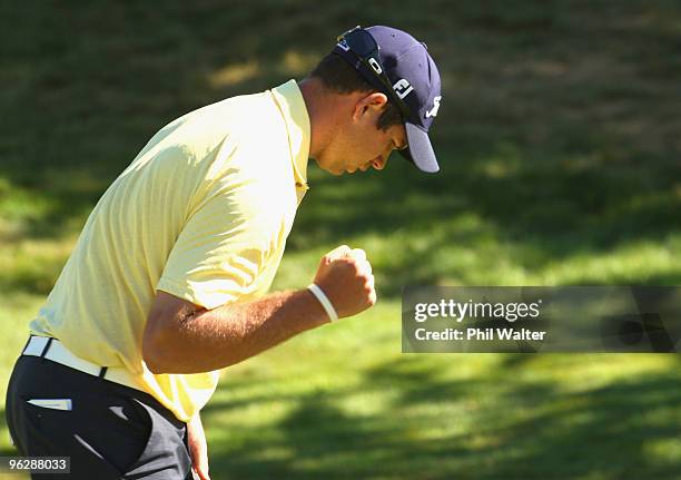 Robert Gates of the USA celebrates sinking his putt on the 17th green during day four of the New Zealand Open at The Hills Golf Club on January 31,...